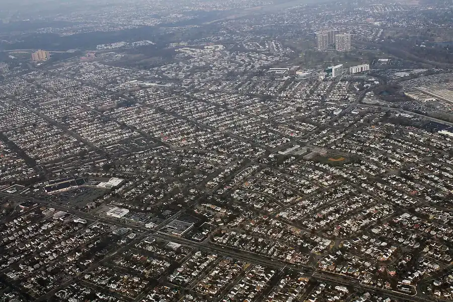 Aerial view of dense residential blocks and streets around North New Hyde Park, New York